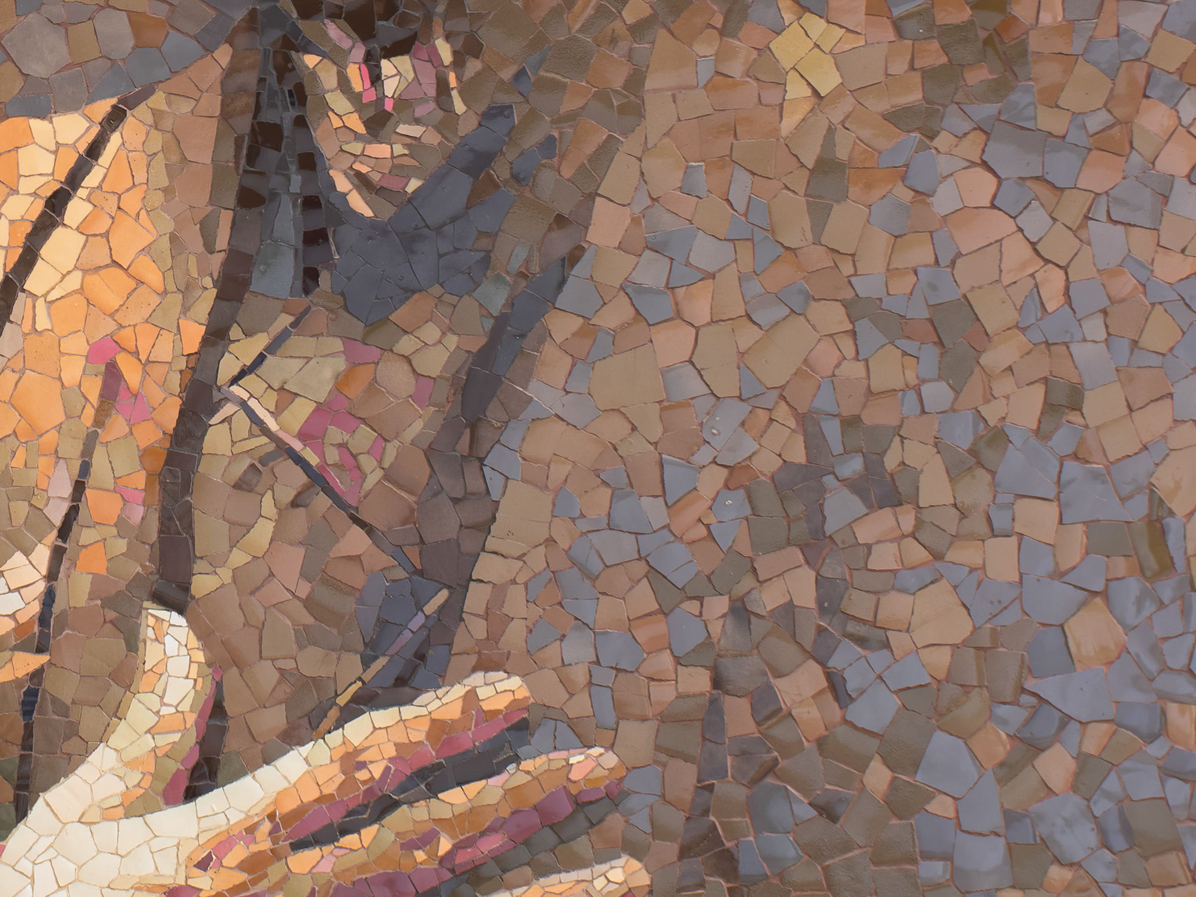 Close-up detail of a glazed Biên Hòa stoneware surface, showing the fragmented, pieced texture of the ceramic.